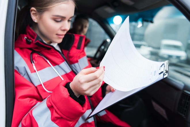 Paramedics and emergency medical technicians are among the jobs in which women earn considerably less than men. [SHUTTERSTOCK]