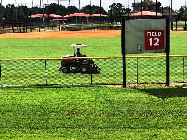 Crews work to maintain the fields at Tyger River Park near Reidville, which will host another major softball tournament next summer. [HERALD-JOURNAL/GOUPSTATE.COM FILE]