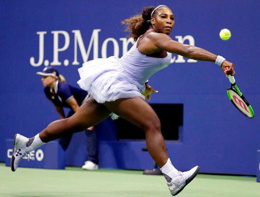Serena Williams chases a shot by Carina Witthoeft, of Germany, during the second round of the U.S. Open tennis tournament, Wednesday, Aug. 29, 2018, in New York. (AP Photo/Julio Cortez)
