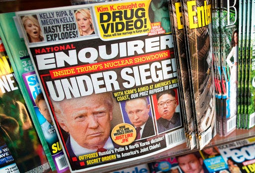 FILE - This July 12, 2017, file photo shows the cover of an issue of the National Enquirer featuring President Donald Trump at a store in New York. Confidential documents obtained by The Associated Press show that the National Enquirer's circulation declined even as it published stories attacking Trump's political foes and, prosecutors claim, helped suppress stories about his alleged sexual affairs. (AP Photo/Mary Altaffer, File)