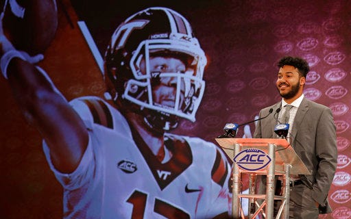 FILE - In this Wednesday, July 18, 2018 file photo, Virginia Tech's Josh Jackson answers a question during a news conference at the NCAA Atlantic Coast Conference college football media day in Charlotte, N.C. (AP Photo/Chuck Burton, File)