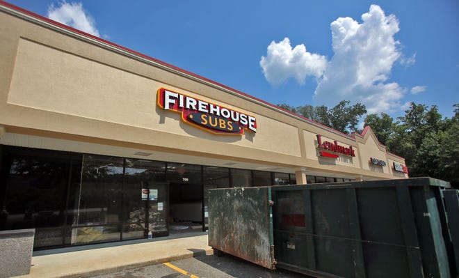 Construction continues to turn the old RadioShack location to a Firehouse Subs in Shelby on Tuesday. [Brittany Randolph/The Star]