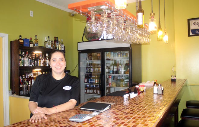 Owner Maria Galvan has been perfecting margaritas and more behind the bar on the second floor of Maddie's La Casita. [PHOTOS BY JAN WADDY/THE NEWS HERALD]