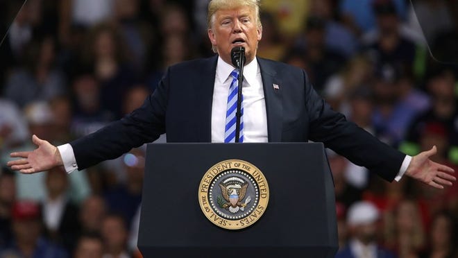 CHARLESTON, WV - AUGUST 21: President Donald Trump speaks at a rally on August 21, 2018 in Charleston, West Virginia. Paul Manafort, a former campaign manager for Trump and a longtime political operative, was found guilty in a Washington court today of not paying taxes on more than $16 million in income and lying to banks where he was seeking loans. (Photo by Spencer Platt/Getty Images)