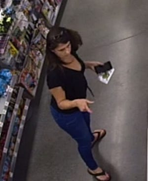 Officials are looking for this woman in connection to a burglary and financial transaction card theft and fraud. [Provided by the Grovetown Department of Public Safety]
