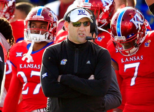 FILE - In this Nov. 18, 2017, file photo, Kansas head coach David Beaty watches during the first half of an NCAA college football game against Oklahoma in Lawrence, Kan. Kansas opens the season against Nicholls State on Saturday night with the future of coach Beaty likely on the line. (AP Photo/Orlin Wagner, File)