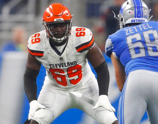 FILE - In this Aug. 30, 2018, file photo, Cleveland Browns offensive tackle Desmond Harrison (69) defends the line as Detroit Lions defensive end Anthony Zettel (69) rushes during the first half of an NFL football preseason game, in Detroit. The Browns could be shaking up their offensive line again. With the season opener against Pittsburgh just a week away, coach Hue Jackson said Friday, Aug. 31, 2018, that “all avenues” are open with his offensive line, which has been in flux since 10-time Pro Bowl tackle Joe Thomas retired after last season. Jackson reiterated he wants the “best five guys out there” and he said undrafted rookie Desmond Harrison could be in the mix. (AP Photo/Paul Sancya, File)