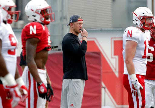 FILE - In this Wednesday, Aug. 8, 2018 file photo, Nebraska head coach Scott Frost blows his whistle during NCAA college football fall practice in Lincoln, Neb. This is what Nebraska fans have been waiting for since December, maybe even longer. Scott Frost’s first game as the Cornhuskers’ head coach is here. That Akron is the opponent is a footnote. Nebraska plays Akron on Saturday, Sept. 1, 2018. (AP Photo/Nati Harnik, File)