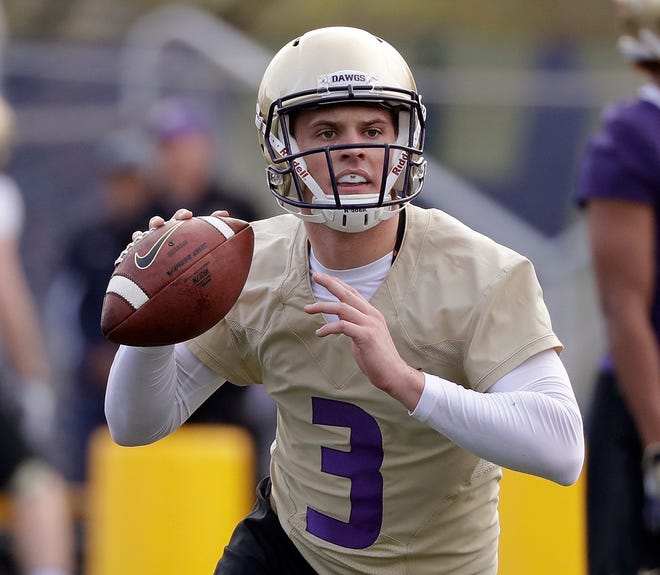 Washington quarterback Jake Browning leads the No. 6 Huskies against No. 9 Auburn in the only opening-week game between top-10 teams. [AP Photo/Elaine Thompson]