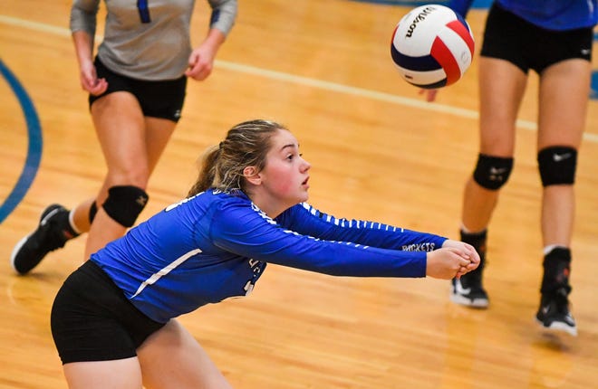 RON JOHNSON/JOURNAL STAR Selena Bryan of Limestone bumps the ball into play during a round robin game with Washington during the Limestone Volleyball Tournament on Saturday.