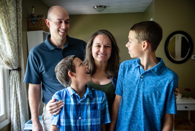Jamie Kaufmann, 42, center, and her husband Jeff, left, know first hand what it's like to have children with life-threatening food allergies including their sons Graham, 11, left, and Miles, 12, right, who both had food allergies when they were toddlers. Jaime Kaufmann used her experience with her children to create the online blog MilkAllergyMom.com to help educate and encourage families dealing with food allergies. 

Photo: Justin L. Fowler/The State Journal-Register