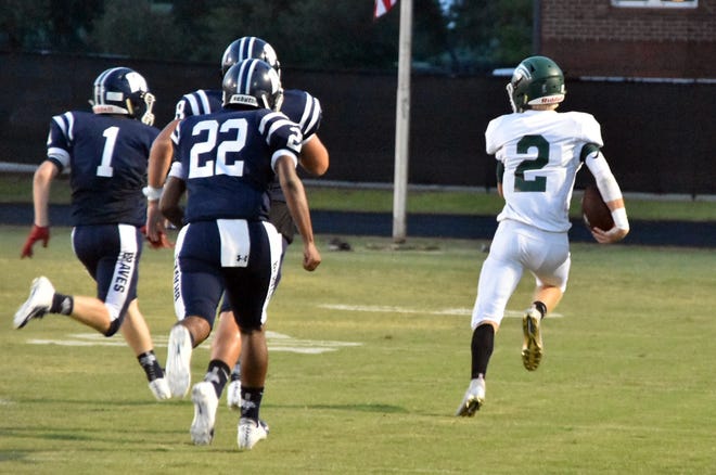 South Walton's JM Allen makes the catch and heads to the end zone early in the first quarter for a 52-yard score. South Walton beat Walton 38-6. [TINA HARBUCK/THE LOG]