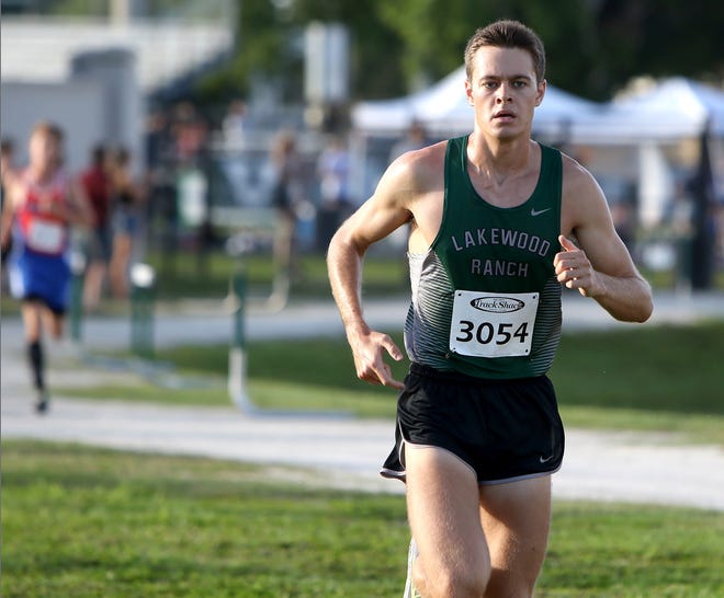 Lakewood Ranch's Jonathan Reid works his way to a first place finish at the Venice Invitational, Saturday, in Venice. [Herald-Tribune photo / Matt Houston]