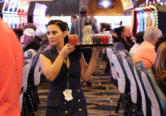 Beverage server Theresa Greaves, of Fall RIver, works on the casino floor. [The Providence Journal/Glenn Osmundson]