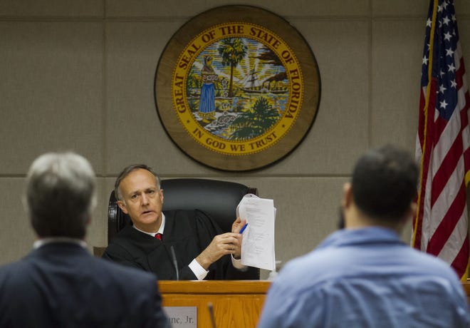 County Judge Jim McCune hears a case involving pleas to two misdemeanor charges of possesion of marijuana less than 20 grams and possesion of drug paraphanalia. [Doug Engle/Ocala Star-Banner]