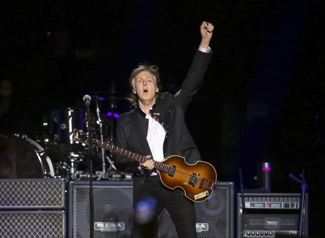 In this Monday, Sept. 11, 2017 file photo, singer/songwriter Paul McCartney performs on stage at the Prudential Center in Newark, NJ. Former Beatle McCartney has told a British newspaper he believes he once saw God during a psychedelic trip. The 76-year-old music legend told The Sunday Times he was þÄúhumbledþÄù by the experience. The music legend is promoting a new album and a fall tour, it was reported on Sunday, Sept. 2, 2018. (Photo by Brent N. Clarke/Invision/AP, File)
