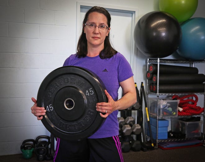 Dr. Heather Mackey-Fowler, a primary care physician in a family practice affiliated with South County Hospital, entered a power-lifting competition and brought home a silver medal. [The Providence Journal/Steve Szydlowski]