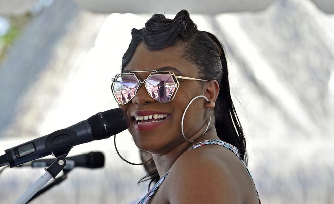 The sixth annual Venice Brew Bash held at Centennial Park in Venice featured Jah Movement, with singer Shantel Norman all smiles here. [Herald-Tribune archive / 2017]