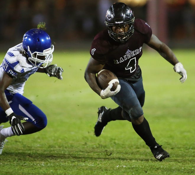 Action during Navarre's home opener against Washington. [MICHAEL SNYDER/DAILY NEWS]