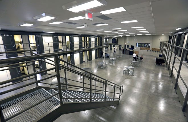 FILE - This June 1, 2018, file photo, shows a housing unit in the west section of the State Correctional Institution at Phoenix in Collegeville, Pa. [AP Photo/Jacqueline Larma, File]
