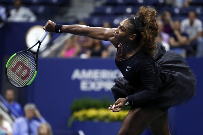 Serena Williams serves to Karolina Pliskova during the quarterfinals of the U.S. Open Tuesday in New York. [AP Photo / Adam Hunger]
