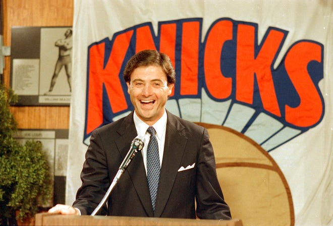 FILE - In this July 13, 1987, file photo, Rick Pitino smiles as he was appointed head coach of the New York Knicks at Madison Square Garden in New York. Rick Pitino knows his coaching days are most likely behind him. He still wants to be involved in the game of basketball where he's spent the past 40 years. "I think my time has passed, I really do," Pitino said of coaching again on Tuesday, Sept, 4, 2018, in an interview at the AP office. (AP Photo/Richard Drew, File)