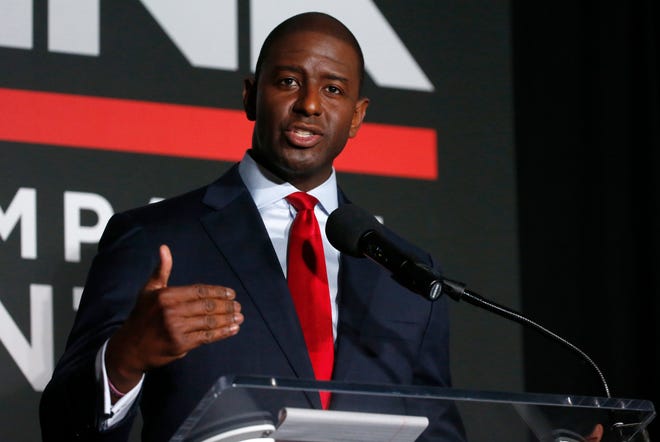 File-This July 18, 2018, file photo shows Tallahassee Mayor Andrew Gillum speaking during a Democratic gubernatorial debate held at Florida Gulf Coast University's Cohen Center in Fort Myers, Fla. The man who could become Florida’s first black governor on Sunday, Sept. 2, 2018, called on his opponent to refrain from name-calling and to focus on the issues. Gillum, was asked about comments Republican U.S. Rep. Ron DeSantis made after Tuesday’s primary. DeSantis said voters aren’t going to “monkey this up” by electing Gillum. (AP Photo/Wilfredo Lee, File)