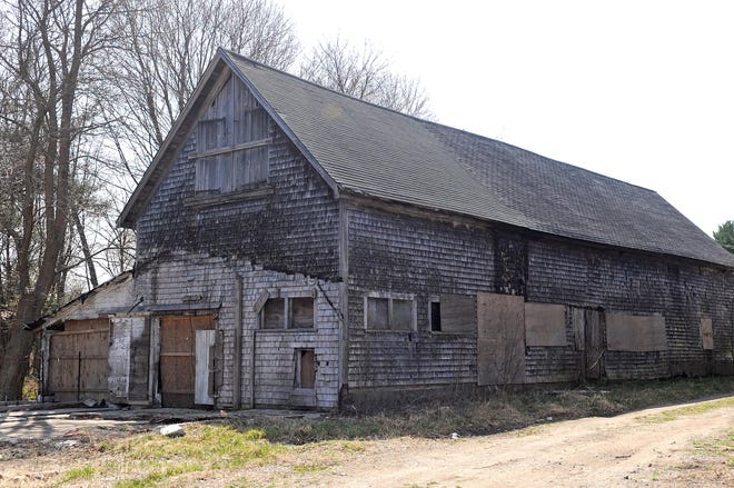 Griffin's Dairy Farm in Abington, seen on Monday, March 26, 2012, has been abandoned and is overgrown and boarded up. (Emily J. Reynolds/The Enterprise)

**WITH STORY