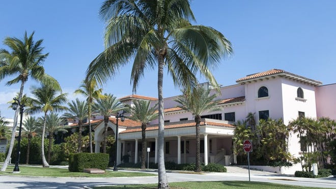 The Palm House hotel-condominium renovation project at 160 Royal Palm Way has been entangled for years in legal battles, including lawsuits, foreclosure proceedings, code violations and recent Chapter 11 bankruptcy filing. Construction ceased at the site in October 2014, and the project is now overseen by a court-appointed receiver. (Meghan McCarthy / Daily News)