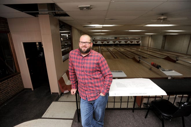 Adam Longacre, with his business partners, will convert the former Louisville Bowl into a craft brewery and restaurant called Unhitched Brewing Co. (CantonRep.com / Julie Vennitti)