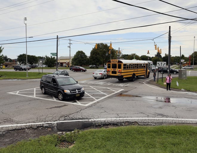 Traffic moves through the intersection of Route 161 and Maple Canyon Avenue on Thursday. The Mid-Ohio Regional Planning Commission released its annual list of the 10 most dangerous intersections in the region, and the Northland intersection ranked first. [Eric Albrecht/Dispatch]