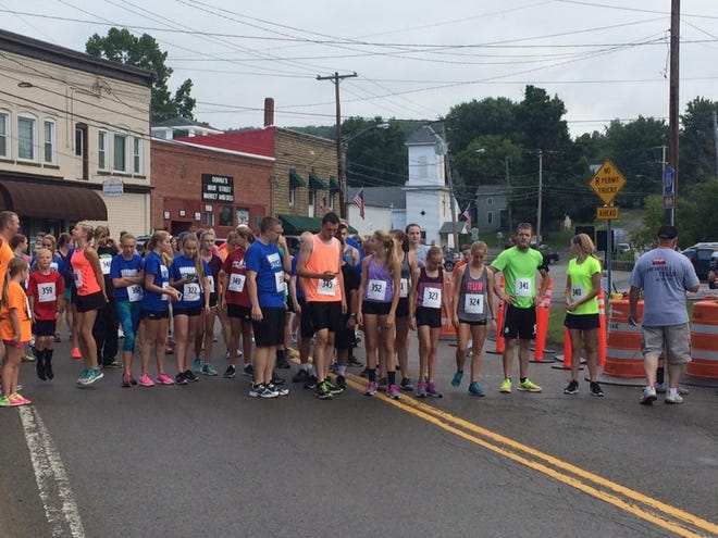 Racers line up for the annual Woodhull Community Day 5K Walk and Run taking place again this Saturday with registration at 8:30 a.m. at the firehall. PHOTO PROVIDED