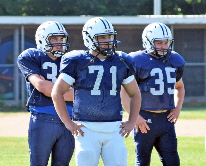STA senior center Dan Youch (71) is the unquestioned leader on a young offensive line featuring some new starters this season. [Mike Zhe/Seacoastonline]