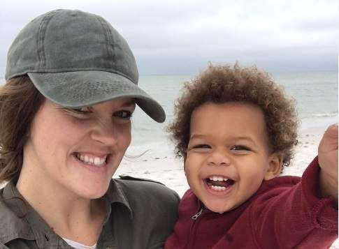 Juliet Warren (left) with her foster child, Jordan Belliveau. The 2-year-old toddler went missing for more than two days and was then found dead late Tuesday. His 21-year-old mother, Charisse Stinson, now faces a charge of first-degree murder in the death of her child.