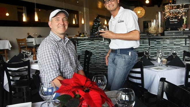 Dustin Parfitt (at left) and Juan Carlos Gando, who own the Fashion Cuisine family of restaurants, are being sued in connection with the November 2017 crash that killed budding equestrians Dana McWilliams and Christian Kennedy and seriously injured Elaine O’Halloran. The three were at the now-shuttered The Grille Fashion Cuisine before the fatal crash. (Bill Ingram/The Palm Beach Post)