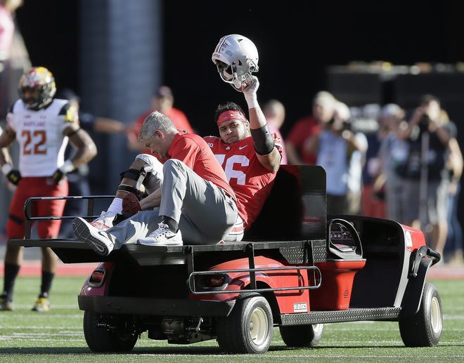 Ohio State guard Branden Bowen is carted off the field in Ohio Stadium during the first half of a game against Maryland on Oct. 7, 2017. [Jonathan Quilter]