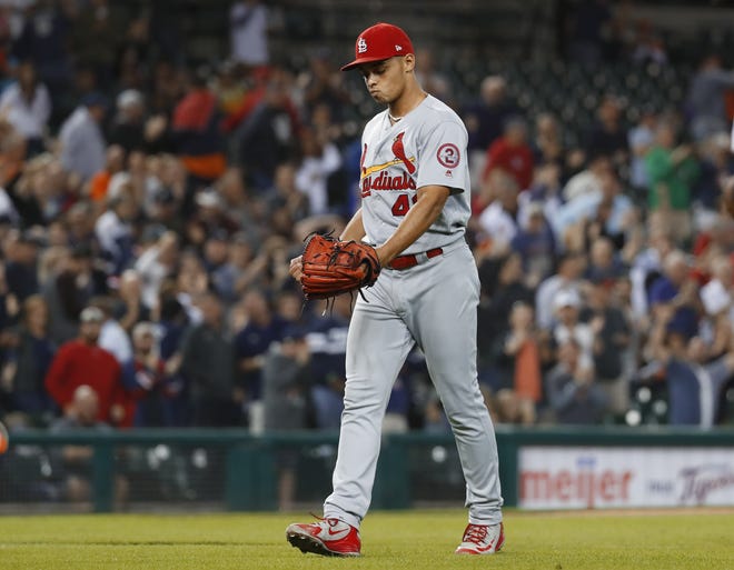 St. Louis Cardinals relief pitcher Jordan Hicks walks off the field after giving up a two-run walk-off home run to Detroit Tigers' Jeimer Candelario during a game in Detroit, on Friday. [AP Photo/Paul Sancya]