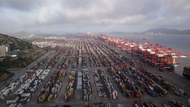 The Yangshan Deep Water Port in Shanghai, China. The U.S. trade deficit in July widening at its fastest rate since 2015 as monthly deficits with China and the European Union both hit new records. [ QILAI SHEN/BLOOMBERG ]
