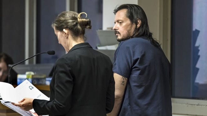 Kevin Flaherty appears in court with a public defender Friday, September 7, 2018 facing three counts of assault with a deadly weapon after he was spotted ringing doorbells in his neighborhood carrying an automatic rifle and wearing a bulletproof vest. (Lannis Waters / The Palm Beach Post)