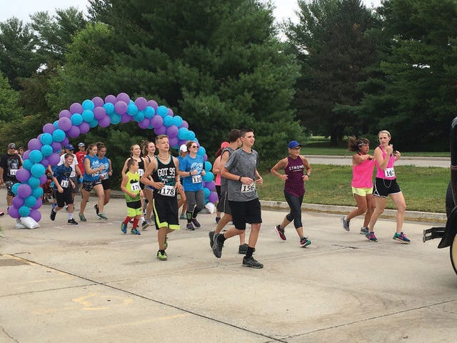 Racers take off at the start of the Run Through Time 5K Fun Run on Saturday, July 14. PHOTO BY LISA WIDICK/THE PERRY CHIEF