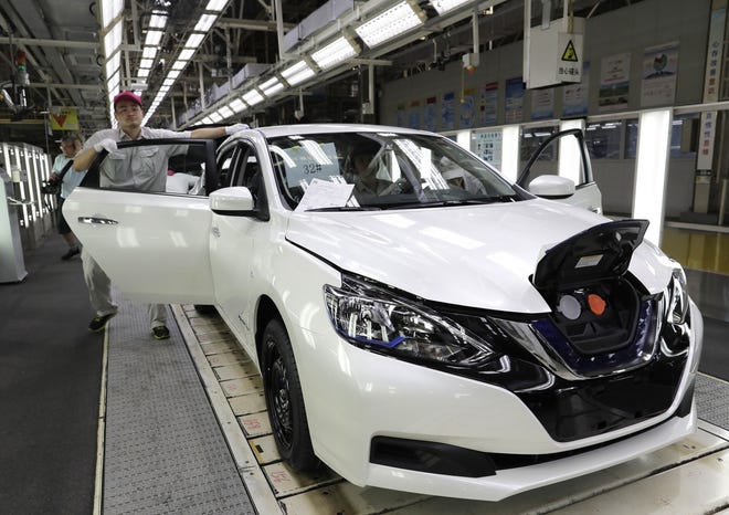 The Sylphy is part of a wave of dozens of electric models planned by global automakers for China where the government is pressing them to accelerate development of the technology. [AP / Vincent Yu]
