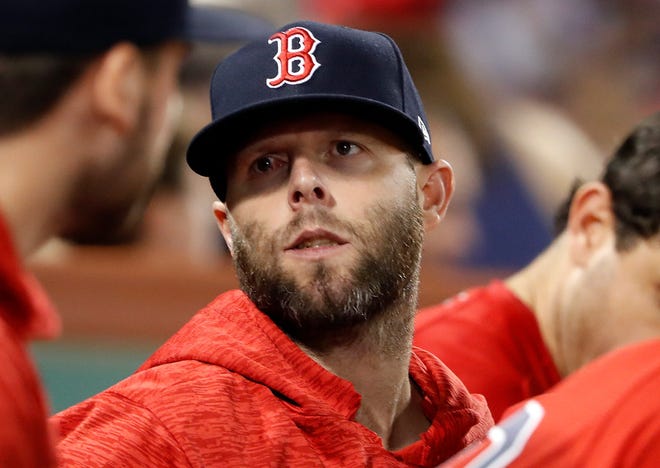 Red Sox second baseman Dustin Pedroia, watching Friday's game against the Astros from the dugout, played in only three games this season, going 1-for-11.