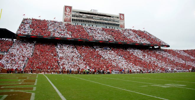 Fans watch during a college football game between the University of Oklahoma Sooners (OU) and the UCLA Bruins at Gaylord Family-Oklahoma Memorial Stadium in Norman, Okla., Saturday, Sept. 8, 2018. Oklahoma won 49-21. Photo by Bryan Terry, The Oklahoman