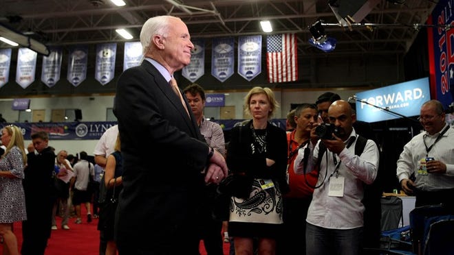 Sen. John McCain is interviewed in the media center at the Presidential debate between President Barack Obama and Governor Mitt Romney on the campus of Lynn University in Boca Raton in 2012. (Gary Coronado/The Palm Beach Post)