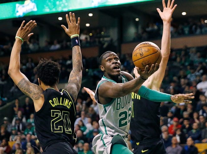 Boston's Jabari Bird, playing against Atlanta in April, will face domestic assault charges for an incident in Brighton Friday night, police said.