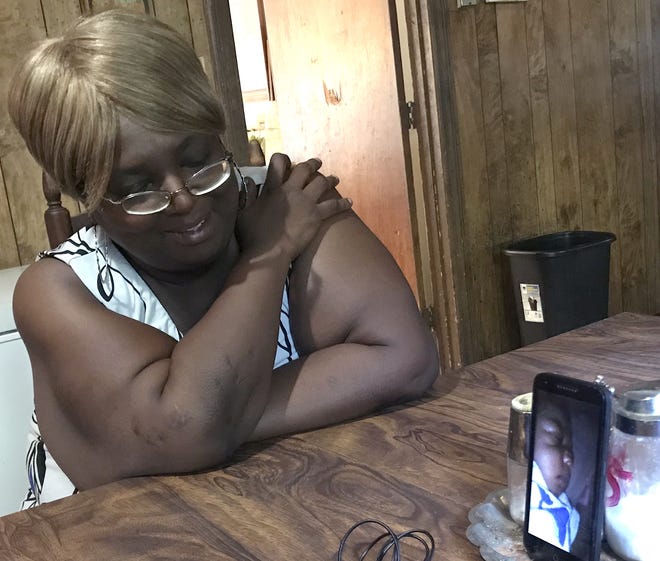 Angela Byers shares a video of her 7-week-old grandson Sincere Moore, who died Tuesday. Sincere's father is accused of killing him. [Joyce Orlando/The Star]