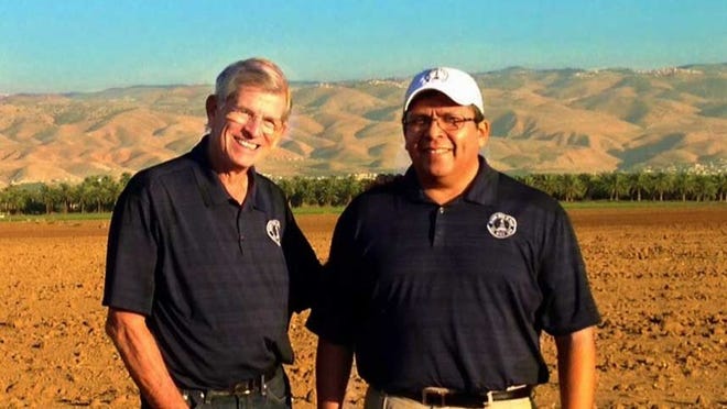 Glen Perry, president of Zion Oil and Gas, left, with Victor Carrillo, company CEO, at a Zion well site in Israel in October 2015.