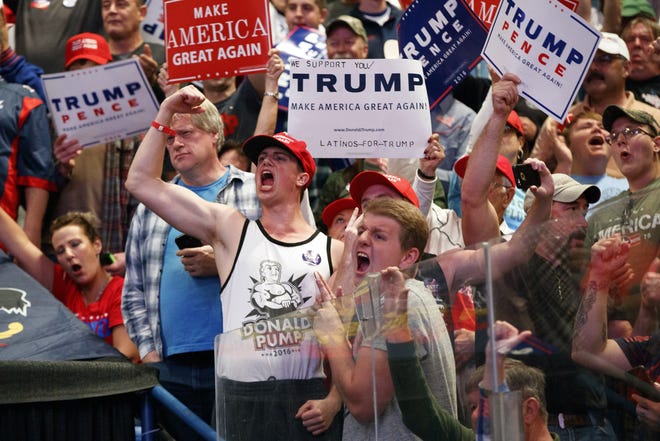 Supporters cheer for Republican presidential candidate Donald Trump cheer during a rally, Monday, Oct. 10, 2016, in Wilkes-Barre, Pa. (AP Photo/ Evan Vucci)