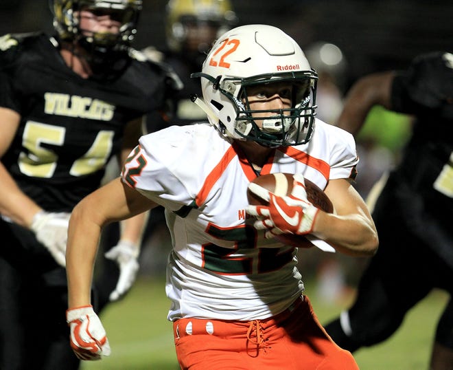 East Lincoln's Cole Barber runs upfield during the Mustangs' victory at North Gaston last Friday night. [JOHN CLARK/THE GASTON GAZETTE]