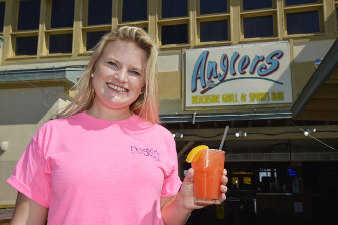 Bailey Brooks grew up eating at Anglers and now works behind the bar. [SAVANNAH VASQUEZ/DAILY NEWS]
